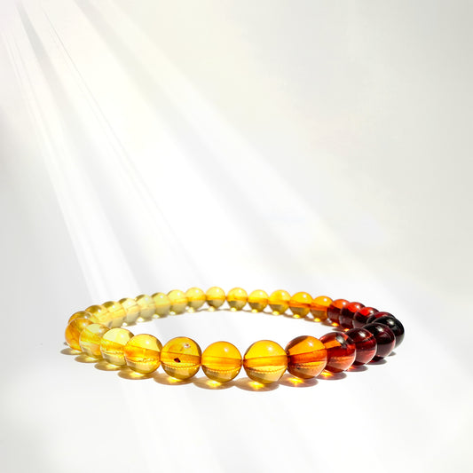 An Amber bracelet exudes warm, grounding energy that fosters emotional healing and protection, helping to release negative emotions and past traumas while promoting self-confidence and inner strength. Ideal for those seeking balance and a deeper connection to their personal power.